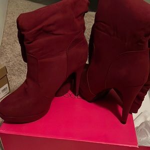 Heeled knee high boots